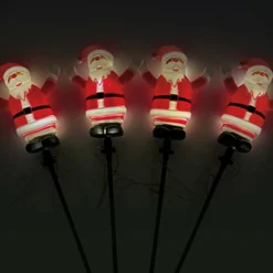 CHRISTMAS DREAM Lot de 4 piquets de jardin solaire (H40 cm) Père Noël lumineux Blanc chaud Rouge New