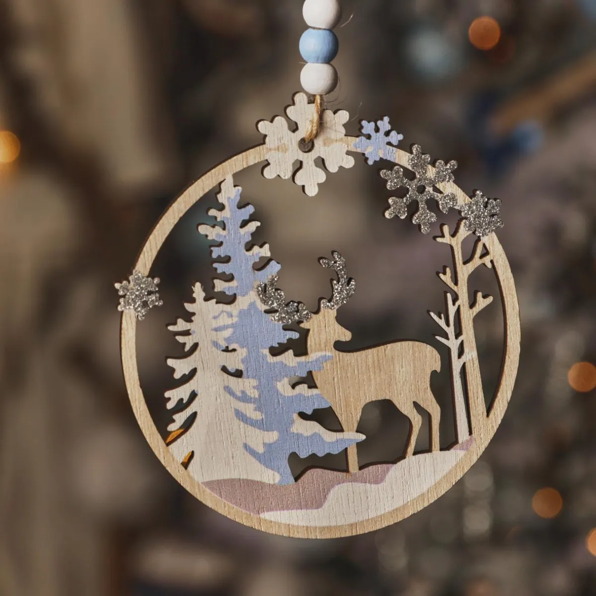 KAEMINGK Suspension de Noël en bois (D11 cm) Caribou dans les bois clair Bleu Hot