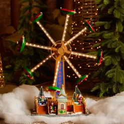 KAEMINGK Village de Noël lumineux, animé et musical (H47 cm) Manège avions Multicolore Discount